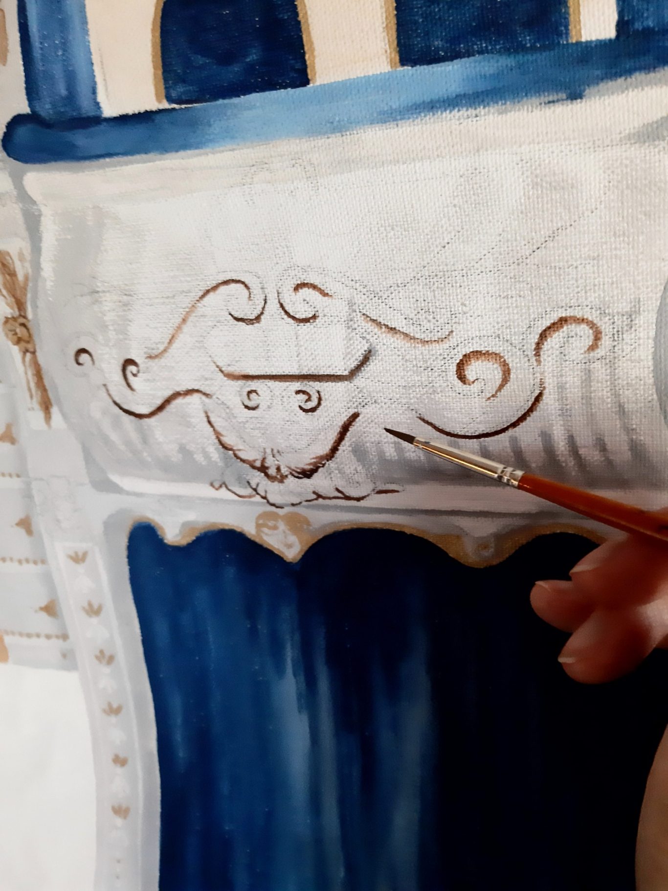 11. A mix of burnt umber and gold acrylic ink was used for the finer detailing of the auditorium